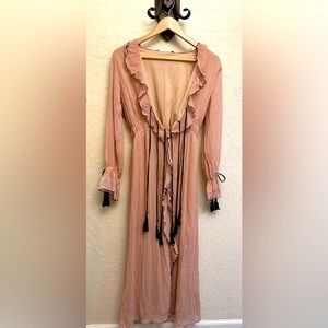 Effortless fancy dress with low neck ruffles bell sleeves and size small